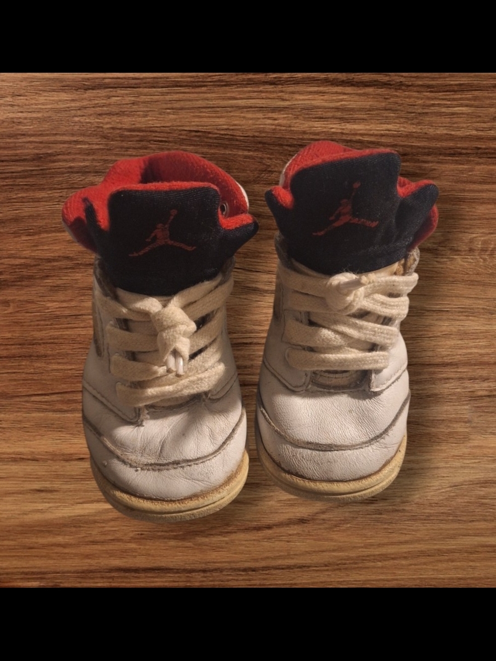 collector vintage Jordan 5 Kids White Sneakers with Black and Red Accents